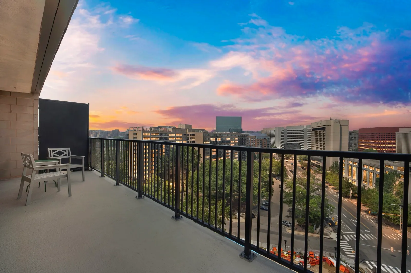 Private balcony at sunset with skyline views over National Landing in Crystal City, Arlington VA